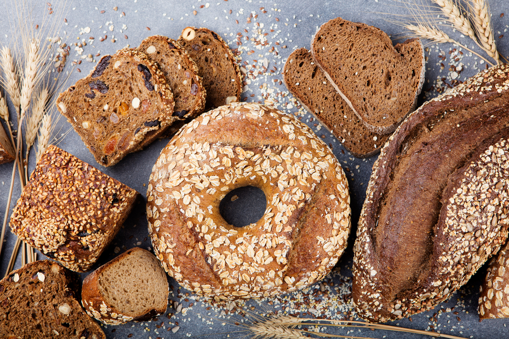 Assortment,Of,Baked,Bread,On,Stone,Table,Background,Composition,With